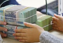Có nên bãi bỏ quy định trần lãi suất USD?